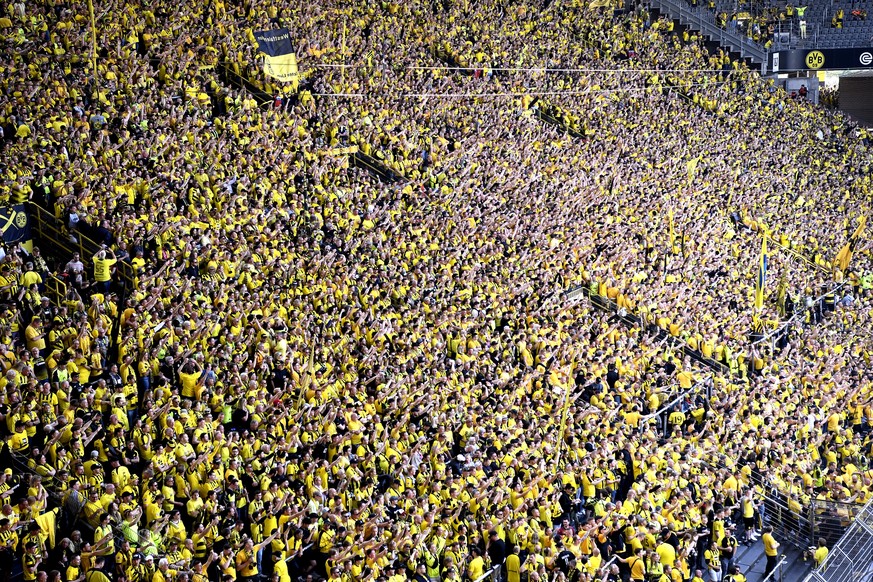 epa10657360 Fans of Borussia Dortmund in the Suedtribuene (South Stand) before the German Bundesliga match between Borussia Dortmund and Mainz 05 in Dortmund, Germany, 27 May 2023. Often referred to a ...