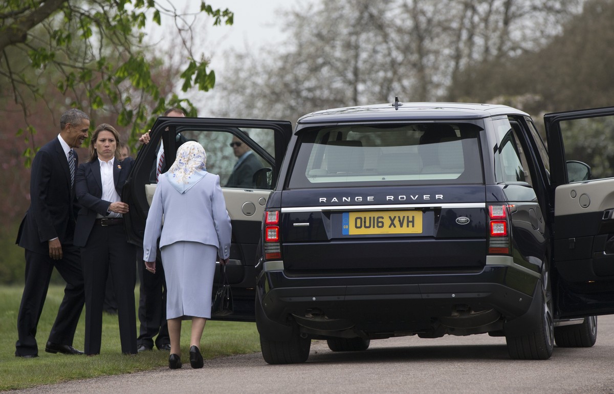 Britain's Queen Elizabeth II and President Barack Obama get into a Range Rover as the president and first lady Michelle Obama arrive at Windsor Castle in Windsor, England, Friday, April 22, 2016. ...