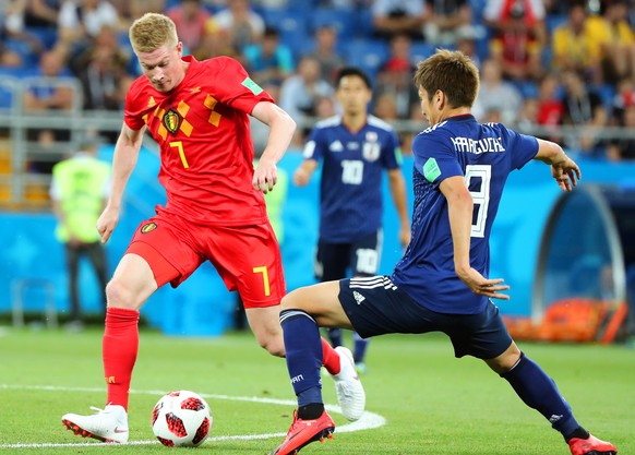 epa06859029 Genki Haraguchi (R) of Japan in action against Kevin De Bruyne (L) of Belgium during the FIFA World Cup 2018 round of 16 soccer match between Belgium and Japan in Rostov-On-Don, Russia, 02 ...