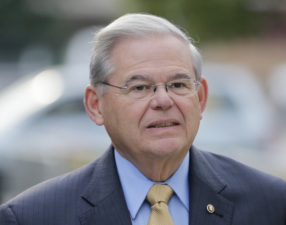 Sen. Bob Menendez arrives to court for his federal corruption trial in Newark, N.J., Wednesday, Sept. 6, 2017. The trial will examine whether he lobbied for Florida ophthalmologist Dr. Salomon Melgen& ...