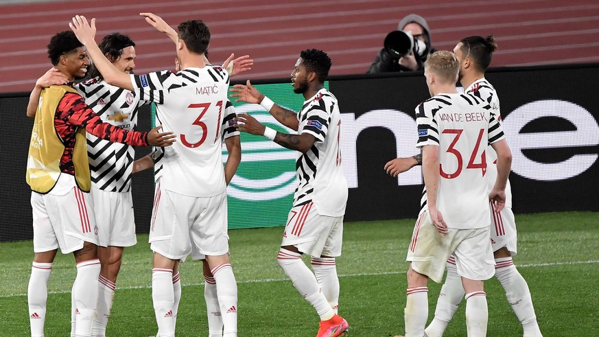 Edinson Cavani of Manchester United, ManU celebrates with team mates after scoring the goal of 2-2 during the Europa League semi-finals 2nd leg football match between AS Roma and Manchester United at  ...