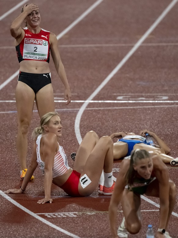 Switzerland&#039;s Annik Kaelin, back, after the 800 m competition of the Women&#039;s Heptathlon at the 2022 European Championships Munich at the Olympiastadion in Munich, Germany, on Thursday, Augus ...