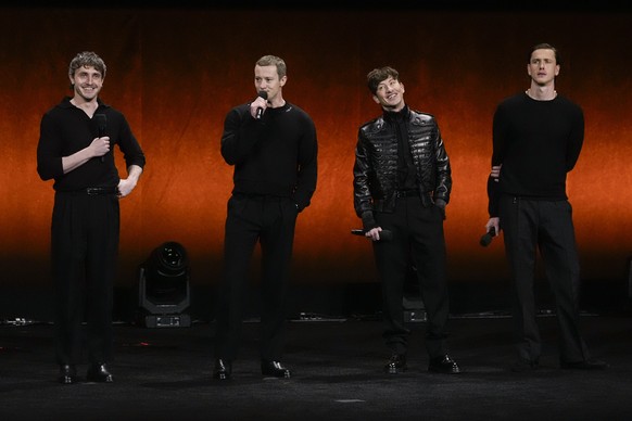 Paul Mescal, from left, Joseph Quinn, Barry Keoghan, and Harris Dickinson, cast members of the upcoming films about The Beatles, speak during the Sony Pictures presentation at CinemaCon on Monday, Mar ...