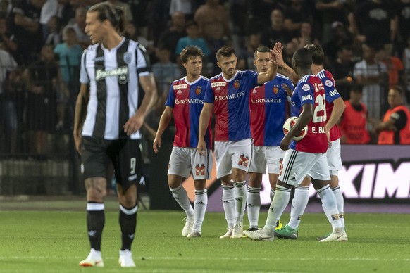 FC Basel&#039;s players cheer after scoring during the UEFA Champions League second qualifying round first leg match between Greece&#039;s PAOK FC and Switzerland&#039;s FC Basel 1893 in the Toumba st ...