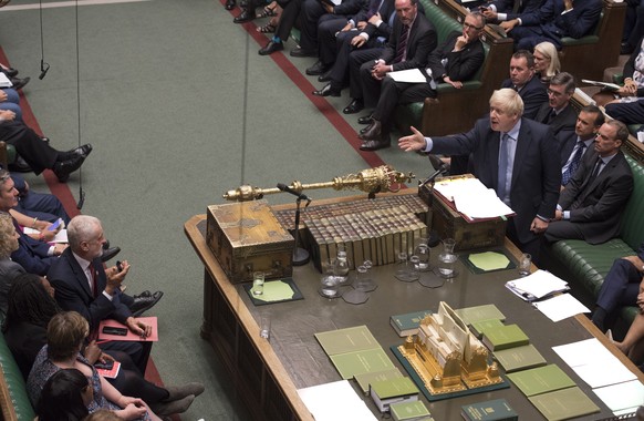 epa07817222 A handout photo made available by the UK Parliament shows British Prime Minister Boris Johnson gesturing during Prime Ministers Questions (PMQS) in the House of Commons in London, Britain, ...