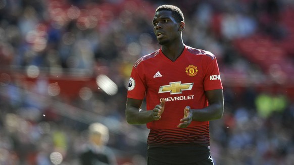Manchester United's Paul Pogba applauds during the English Premier League soccer match between Manchester United and Cardiff City at Old Trafford in Manchester, England, Sunday, May 12, 2019. (AP Phot ...