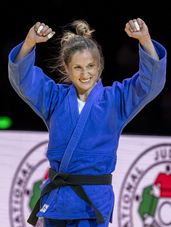 epa09253732 Fabienne Kocher of Switzerland celebrates after defeating Joana Ramos of Portugal in their bronze medal bout of the women&#039;s 52kg category at the World Judo Championships in Budapest,  ...