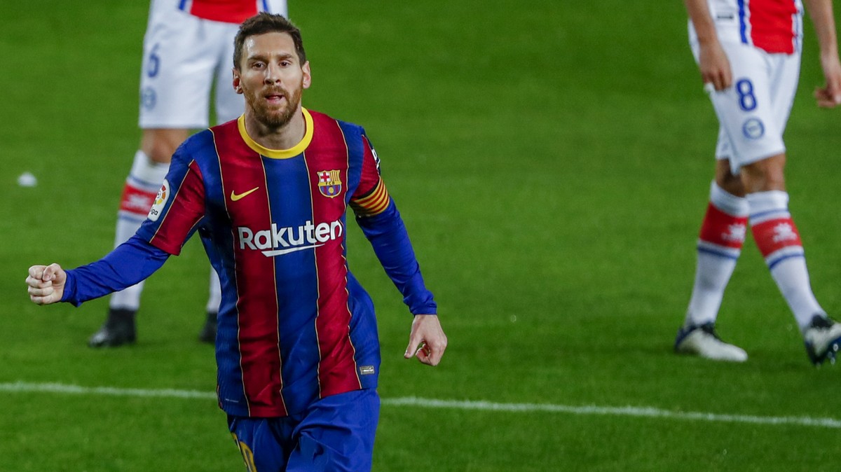 Barcelona's Lionel Messi celebrates after scoring his side's second goal during the Spanish La Liga soccer match between FC Barcelona and Alaves at the Camp Nou stadium in Barcelona, Spain,  ...