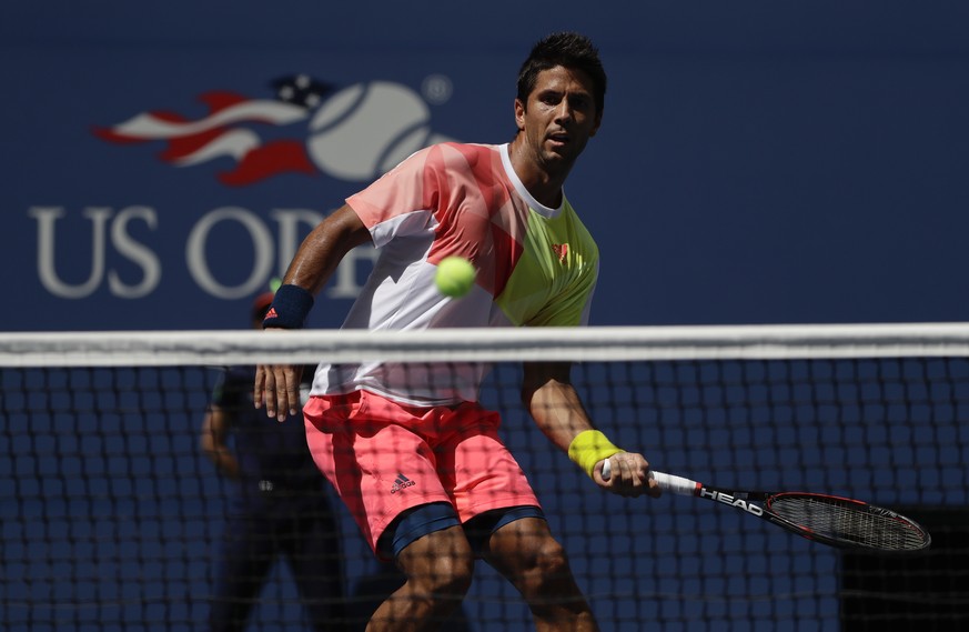 Fernando Verdasco, of Spain, returns a shot at the net to Stan Wawrinka, of Switzerland, during the first round of the U.S. Open tennis tournament, Tuesday, Aug. 30, 2016, in New York. (AP Photo/Frank ...