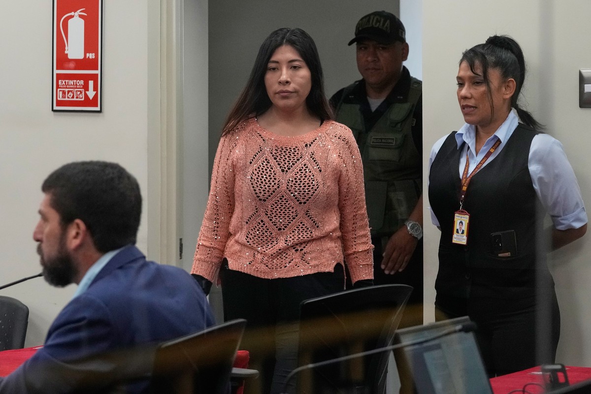 Peruvian former Prime Minister Betssy Chavez arrives for her trial on charges of rebellion and conspiracy against the state at a police base on the outskirts of Lima, Peru, Tuesday, March 18, 2025. (A ...