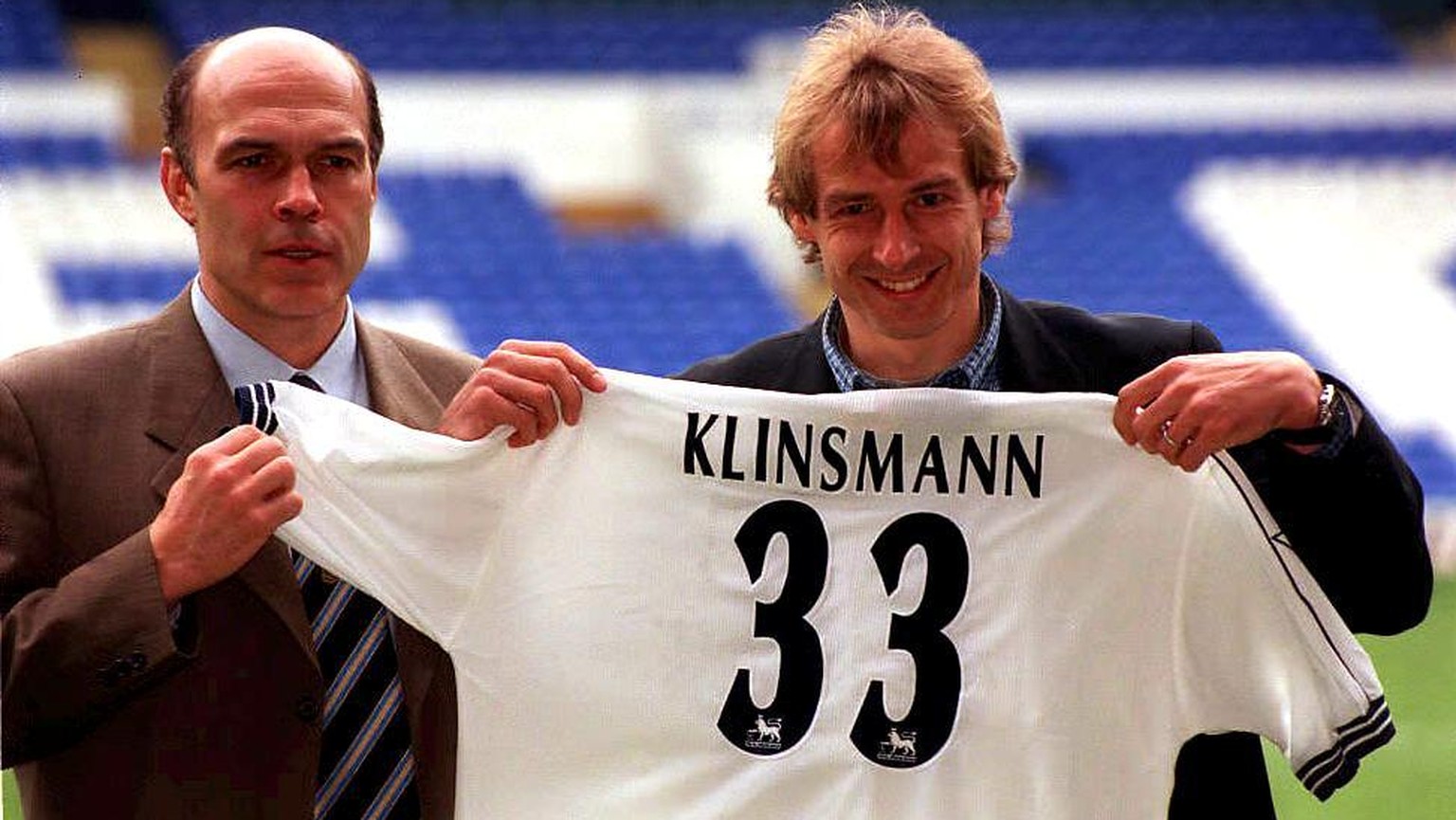 LDN01-22DEC97-LONDON: Tottenham Hotspur boss Christian Gross (L) with German star striker Juergen Klinsmann during a news conference in London 22 December, after it was annouced that Klinsmann has rej ...
