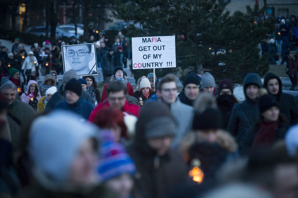 People march during a silent protest in memory of murdered journalist Jan Kuciak and his girlfriend Martina Kusnirova in Bratislava, Slovakia, on Wednesday, Feb. 28, 2018. Investigative journalist Kuc ...