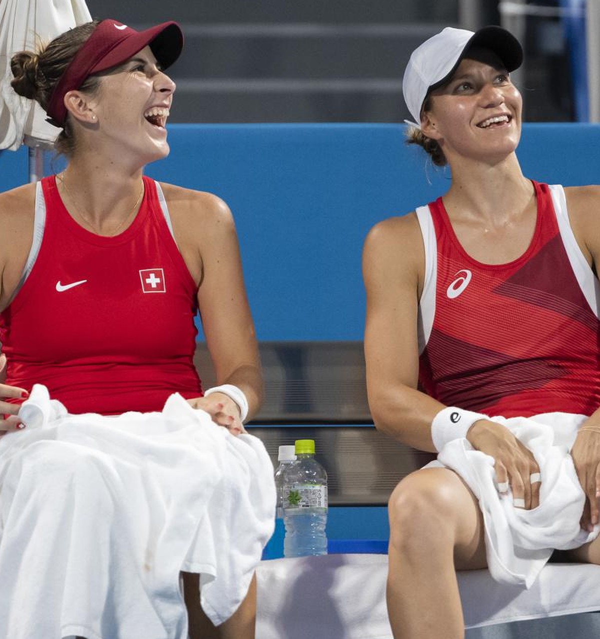 Belinda Bencic, left, and Viktorija Golubic during the women's doubles tennis quarterfinal match against Ellen Perez and Samantha Stosur of Australia, at the 2020 Tokyo Summer Olympics in Tokyo,  ...