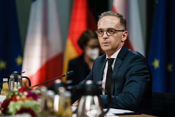 epa09459291 German Foreign Minister Heiko Maas looks on during a meeting on the occasion of 30 years of ?Weimar Triangle? in Weimar, Germany, 10 September 2021. The &#039;Weimar Triangle&#039; is a gr ...