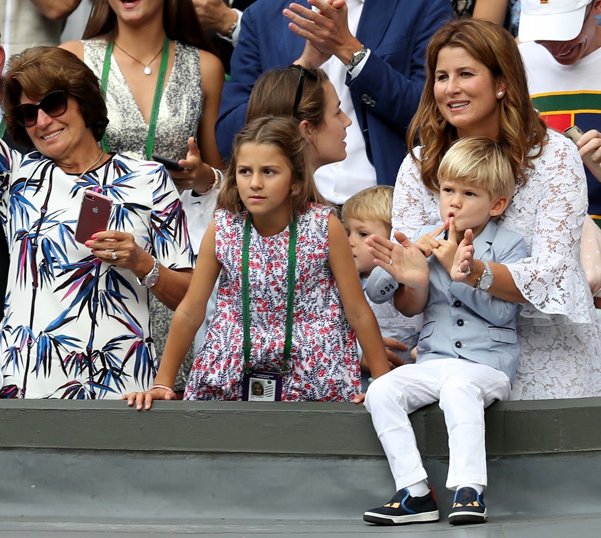 epa06091469 Roger Federer's wife Mirka (R) and the children react after Roger Federer of Switzerland won against Marin Cilic of Croatia during the Men's final match for the Wimbledon Champio ...