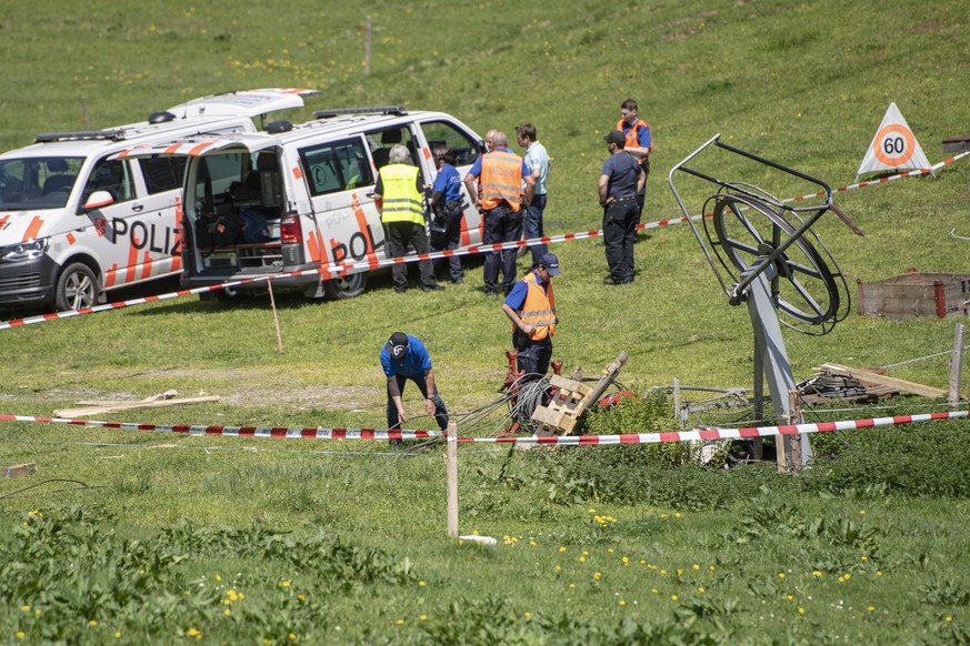 The accident site closed off by the police after an accident during the inspection of the Titlis cable car between Engelberg and Stand, on Wednesday, June 5, 2019, in Engelberg, Switzerland. (KEYSTONE ...