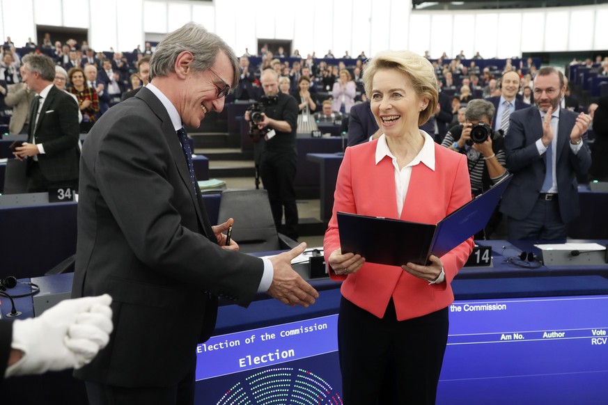 European Commission President Ursula von der Leyen is congratulated by European Parliament President David Sassoli at the European Parliament Wednesday, Nov. 27, 2019 in Strasbourg, eastern France. Ur ...