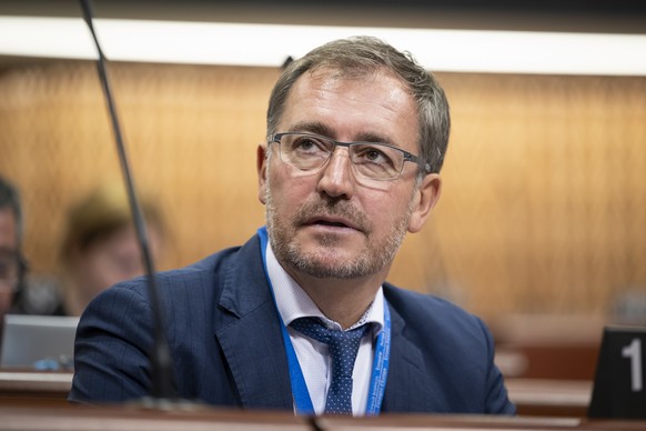 Roland Rino Buechel, Member of Swiss Delegation to the Parliamentary Assembly of the Council of Europe, follows the debates in the Palace of Europe, during the third part of the 2024 Ordinary Session  ...