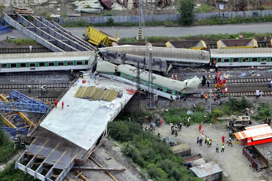 An areal view on the scene of the train accident in Studenka, some 360 kilometers east of Prague, Czech Republic, on Friday, Aug. 8, 2008. The long-distance passenger train from Poland smashed into a  ...