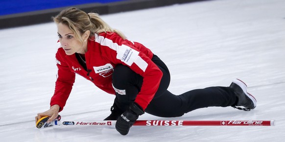 Switzerland skip Silvana Tirinzoni watches her shot against South Korea during a match at the women&#039;s world curling championship in Calgary, Alberta,, Friday, April 30, 2021. (Jeff McIntosh/The C ...
