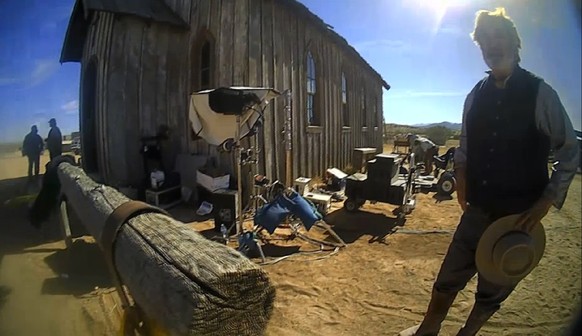 FILE - In this image from video released by the Santa Fe County Sheriff&#039;s Office, Alec Baldwin speaks with investigators following a fatal shooting on a movie set in Santa Fe, N.M. A judge is sch ...