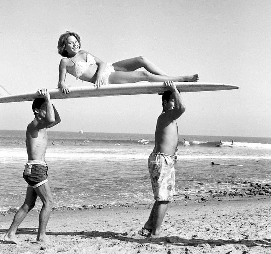UNITED STATES - CIRCA 1960: Surfer Girl C. mid 1960s, Southern California, Surfer Girl. (Photo by Michael Ochs Archives/Getty Images)