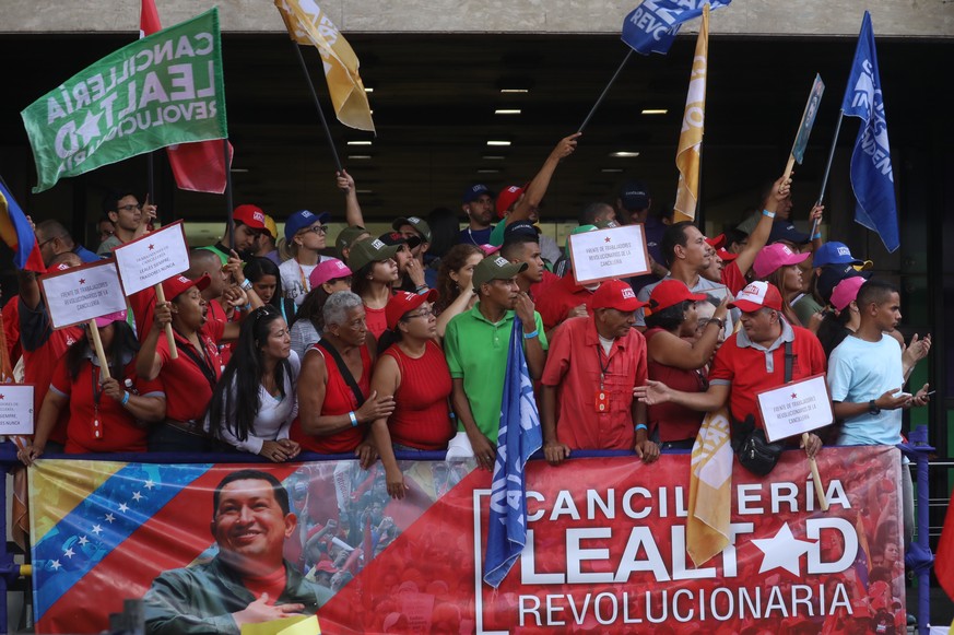 epa07532779 Hundreds participate in a rally led by Venezuelan President Nicolas Maduro to celebrate the withdrawal of the country from the Organization of American States (OAS), in Caracas, Venezuela, ...
