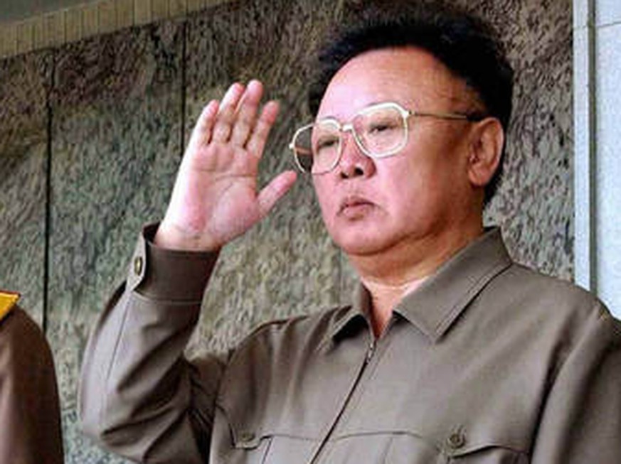 Dangerous times ... military leaders have reportedly been removed on the pretext of dishonouring the late Kim Jong-Il, right.