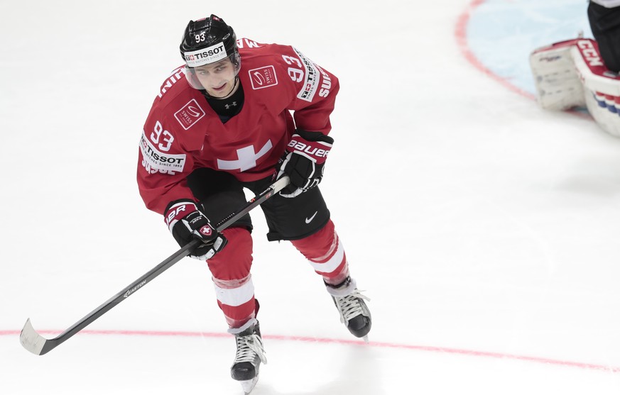 Switzerlands Lino Martschini fails to score against Kazakhstans goalie Vitali Kolesnik during the penalty shoot out at the Ice Hockey World Championships Group A match between Switzerland and Kazakh ...