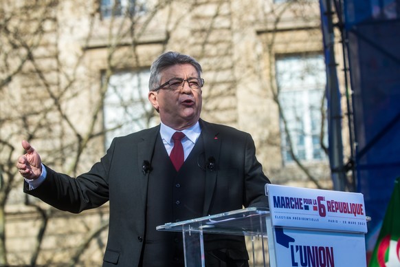 epa09838785 La France Insoumise (LFI) party presidential candidate Jean-Luc Melenchon addresses his supporters after a &#039;March for the 6th Republic&#039; at Republique Square , in Paris, France, 2 ...