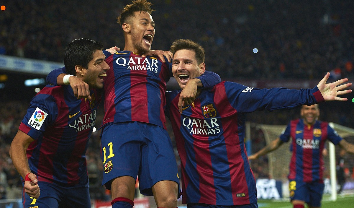 FILE - In this Sunday, Jan. 11, 2015 file photo, FC Barcelona's Lionel Messi, right, Neymar, center, and Luis Suarez, celebrate after scoring against Atletico Madrid during a Spanish La Liga socc ...