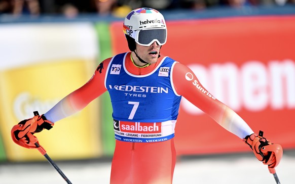 epa11225565 Daniel Yule of Switzerland reacts in the finish area after his second run in the Men&#039;s Slalom race at the FIS Alpine Skiing World Cup finals in Saalbach Hinterglemm, Austria, 17 March ...