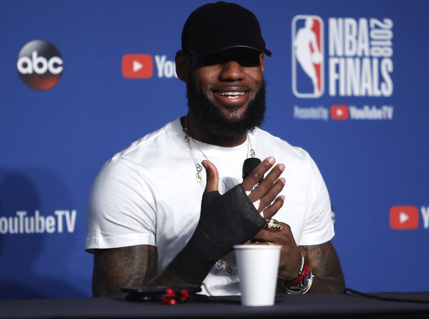 epa06795628 Cleveland Cavaliers forward LeBron James responds to a question during post NBA Finals in game four after losing to the Golden State Warriors at Quicken Loans Arena in Cleveland, Ohio, USA ...