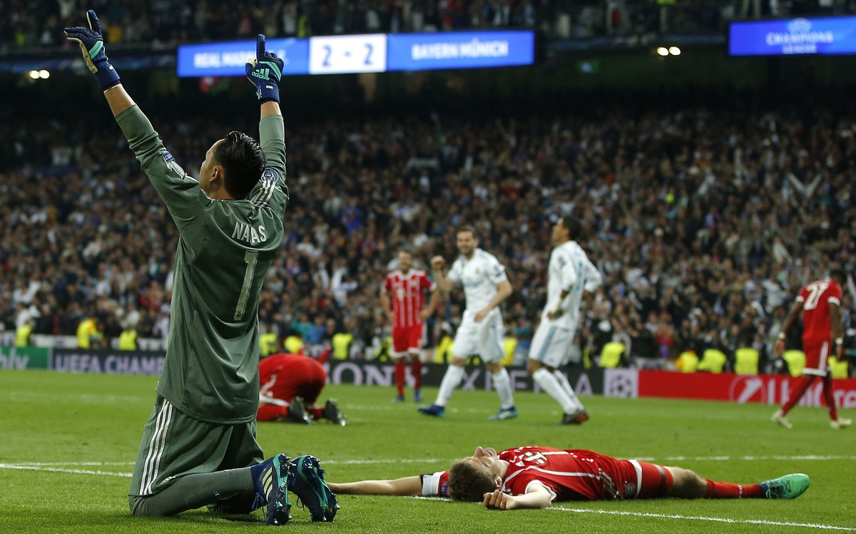 Real Madrid's goalkeeper Keylor Navas celebrates after Madrid reached its third straight Champions League final 4-3 on aggregate at the Champions League semifinal second leg soccer match between ...