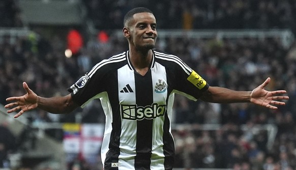 Newcastle United&#039;s Alexander Isak celebrates after scoring the opening goal during the English Premier League soccer match between Newcastle United and Wolverhampton Wanderers at St. James&#039;  ...