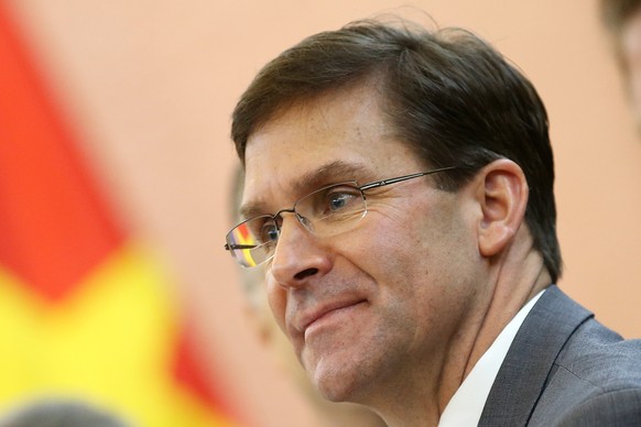 epa08010458 US Secretary of Defense Mark Esper talks to Vietnam&#039;s Minister of National Defence Ngo Xuan Lich (not pictured) during a meeting in Hanoi, Vietnam, 20 November 2019. EPA/LUONG THAI LI ...