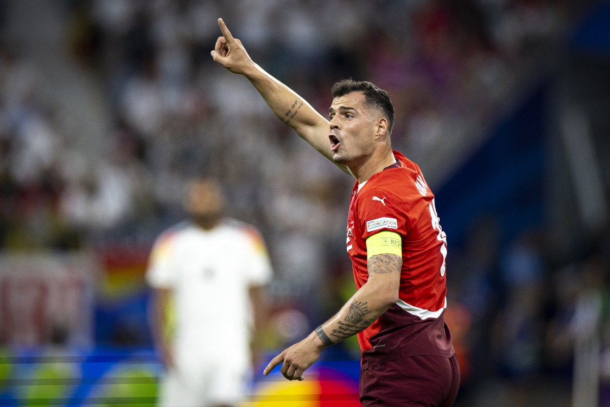 Switzerland's Granit Xhaka reacts during a Group A match between Switzerland and Germany at the Euro 2024 soccer tournament in Frankfurt am Main, Germany, Sunday, June 23, 2024. (KEYSTONE/Peter K ...