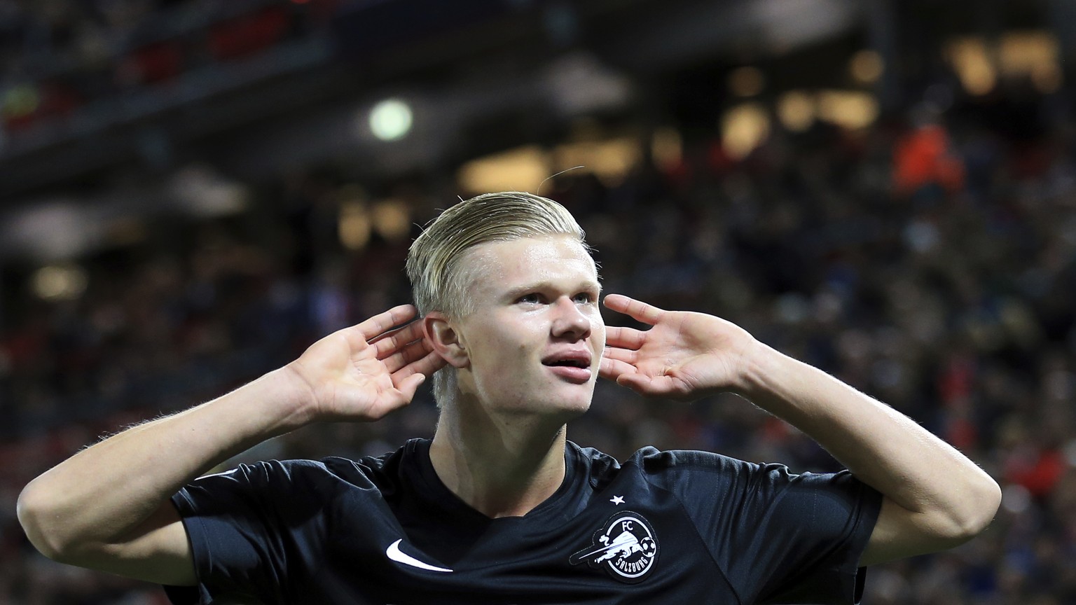 Salzburg&#039;s Erling Braut Haland celebrates after scoring his side&#039;s third goal during the Champions League group E soccer match between Liverpool and Red Bull Salzburg at Anfield stadium in L ...