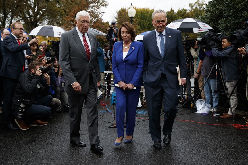 Speaker of the House Nancy Pelosi of Calif., center, Senate Minority Leader Sen. Chuck Schumer of N.Y., right, and House Majority Leader Steny Hoyer of Md., walk from the microphones after speaking wi ...