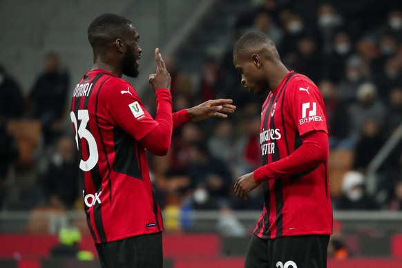 epa09794782 AC Milan&#039;s defender Fikayo Tomori (left) and AC Milan&#039;s defender Pierre Kalulu during the Italian Cup semi final soccer match between AC Milan and FC Inter at Giuseppe Meazza Sta ...