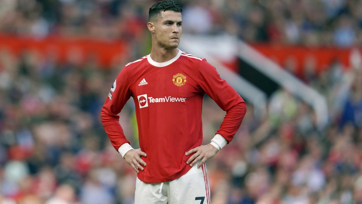 FILE- Manchester United's Cristiano Ronaldo stands on the pitch during the English Premier League soccer match between Manchester United and Norwich City at Old Trafford stadium in Manchester, En ...
