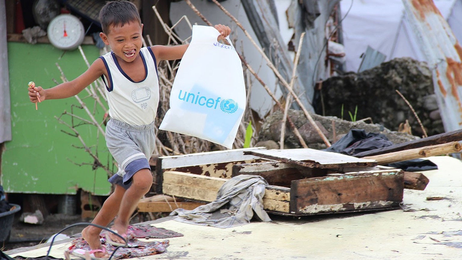 Philippines, December 2013. 6 year old Jerick with a bag of UNICEF school supplies.

Dylene (42), her husband Gonirie (38), and her 7 children live in San Roque. An area which was devastated by Typhoo ...