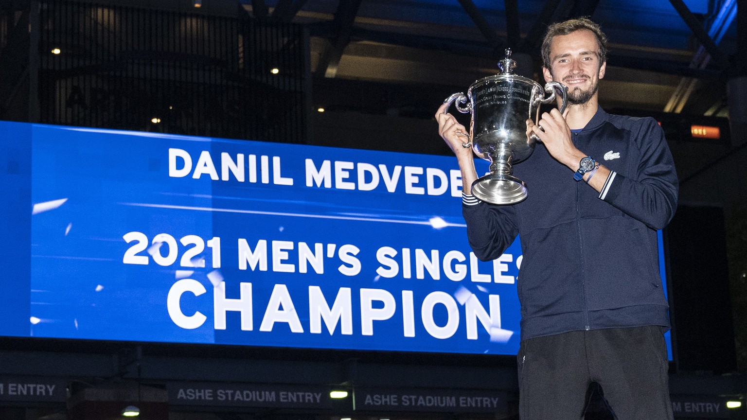 Daniil Medvedev, of Russia, holds up the championship trophy after defeating Novak Djokovic, of Serbia, in the men&#039;s singles final of the US Open tennis championships, Sunday, Sept. 12, 2021, in  ...