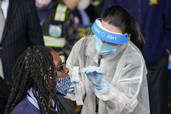 Bus Operator, Cathy Davis-Baker, gets a Covid test as part of an initiative by the Metropolitan Transportation Authority to test its workers Tuesday, Oct. 27, 2020, at the Grand Avenue Bus Depot in Ne ...