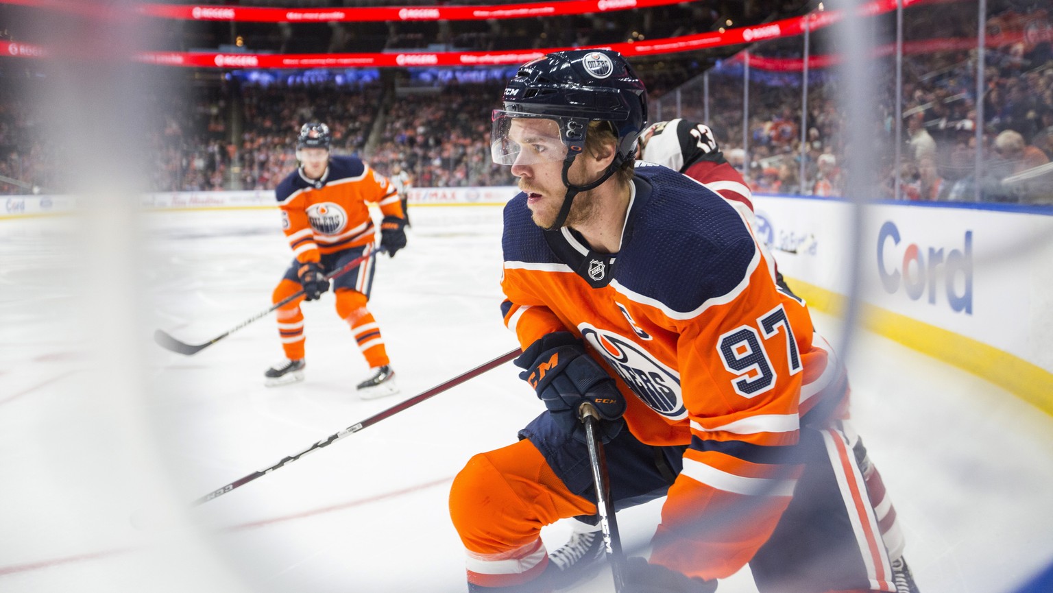 Edmonton Oilers center Connor McDavid (97) skates in the corner during the first period of the team&#039;s NHL hockey preseason game against the Arizona Coyotes on Tuesday, Sept. 24, 2019, in Edmonton ...