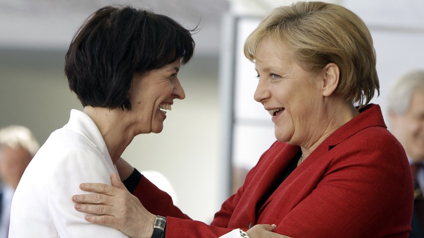 German Chancellor Angela Merkel, right, welcomes the President of Switzerland, Doris Leuthard, left, in front of the chancellery in Berlin, Germany, Wednesday, April 28, 2010. (AP Photo/Michael Sohn)  ...