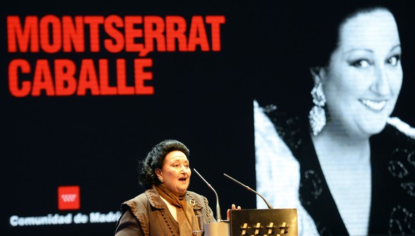 (FILES) Spanish Catalan opera soprano Montserrat Caballe laughs after being awarded the International medal for Arts on November 18, 2013 in Madrid during the culture prize giving ceremony in the Red  ...