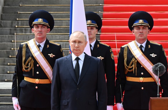 epa10713477 Russian President Vladimir Putin before addressing units of the Russian Defence Ministry, the Russian National Guard Troops (Rosgvardiya), the Russian Ministry of Internal Affairs (MVD), t ...