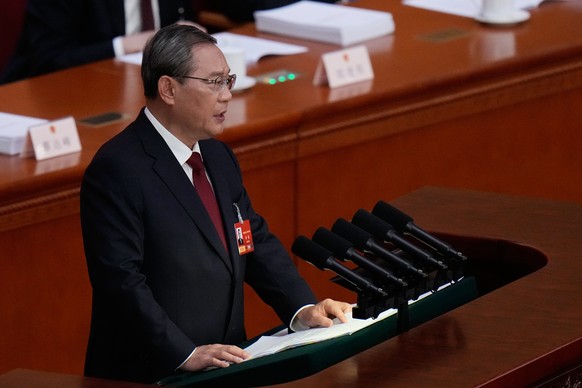 Chinese Premier Li Qiang speaks during opening session of the National People's Congress (NPC) in Beijing, Thursday, March 5, 2026. (AP Photo/Andy Wong)
China Congress