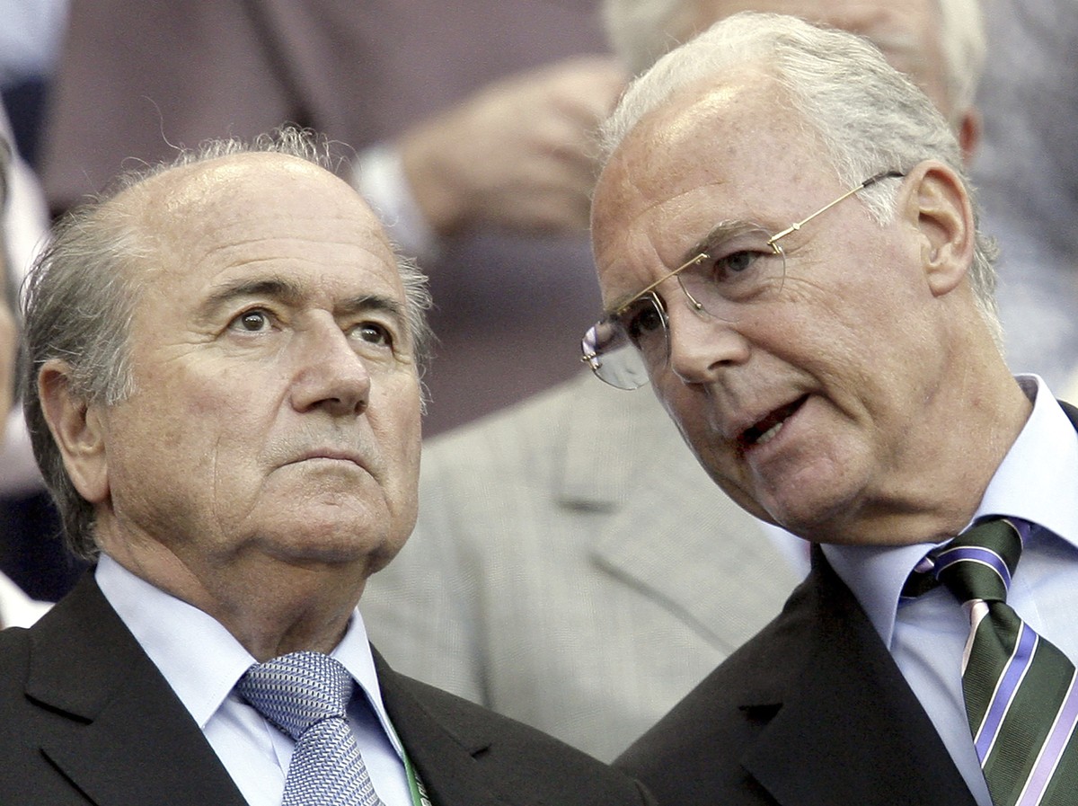 FILE - Germany's Ogranizing Committee Chairman Franz Beckenbauer, right, talks to Joseph Sepp Blatter, chairman of the International Football Federation FIFA, from Switzerland, left, prior to the ...